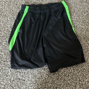 I’m selling black and green athletic shorts